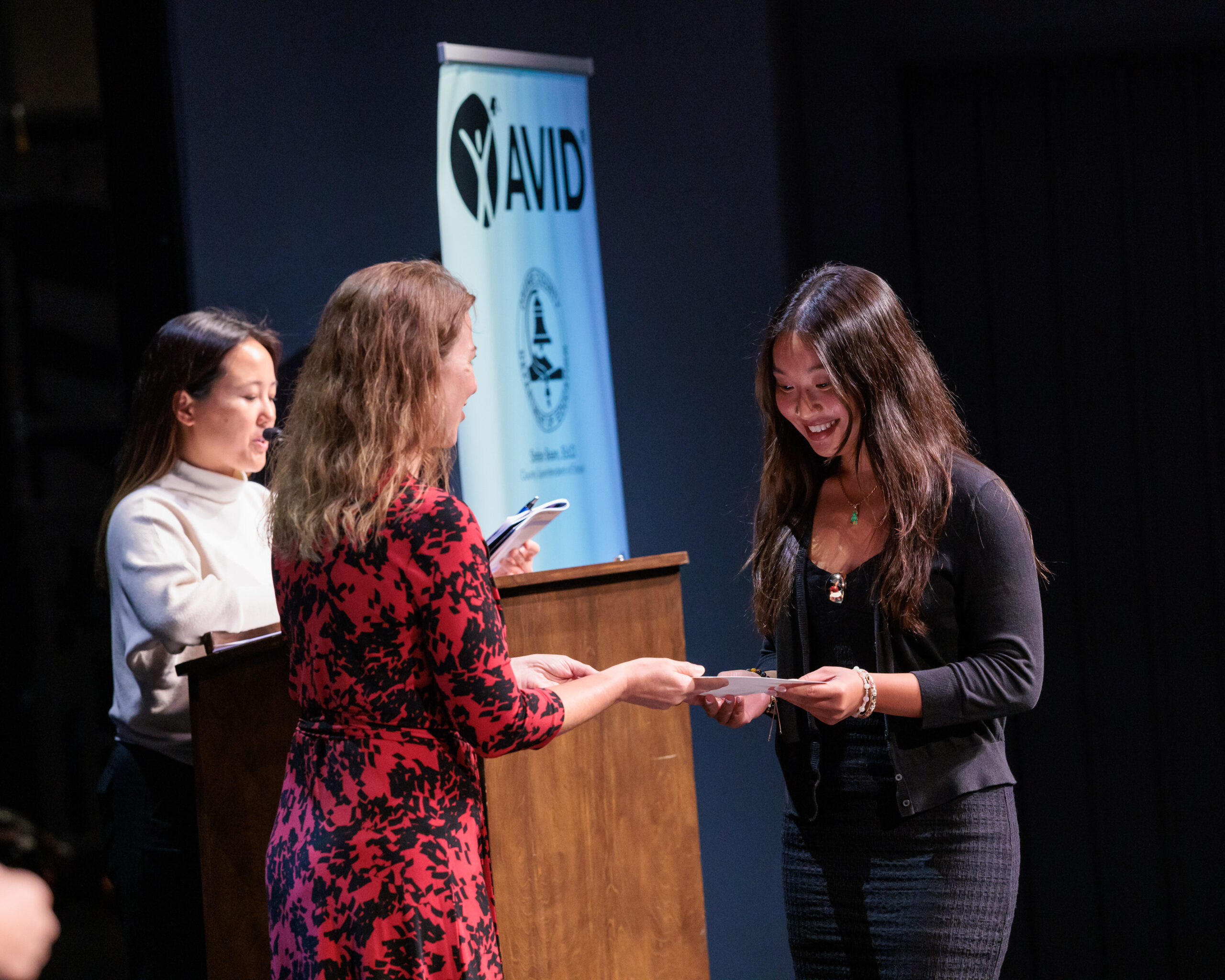 Trish Walsh, director of Academic Content and Instructional Support at the Orange County Department of Education, presents scholarships during the 2026 OC AVID Senior Standout Recognition and Scholarship Presentation.