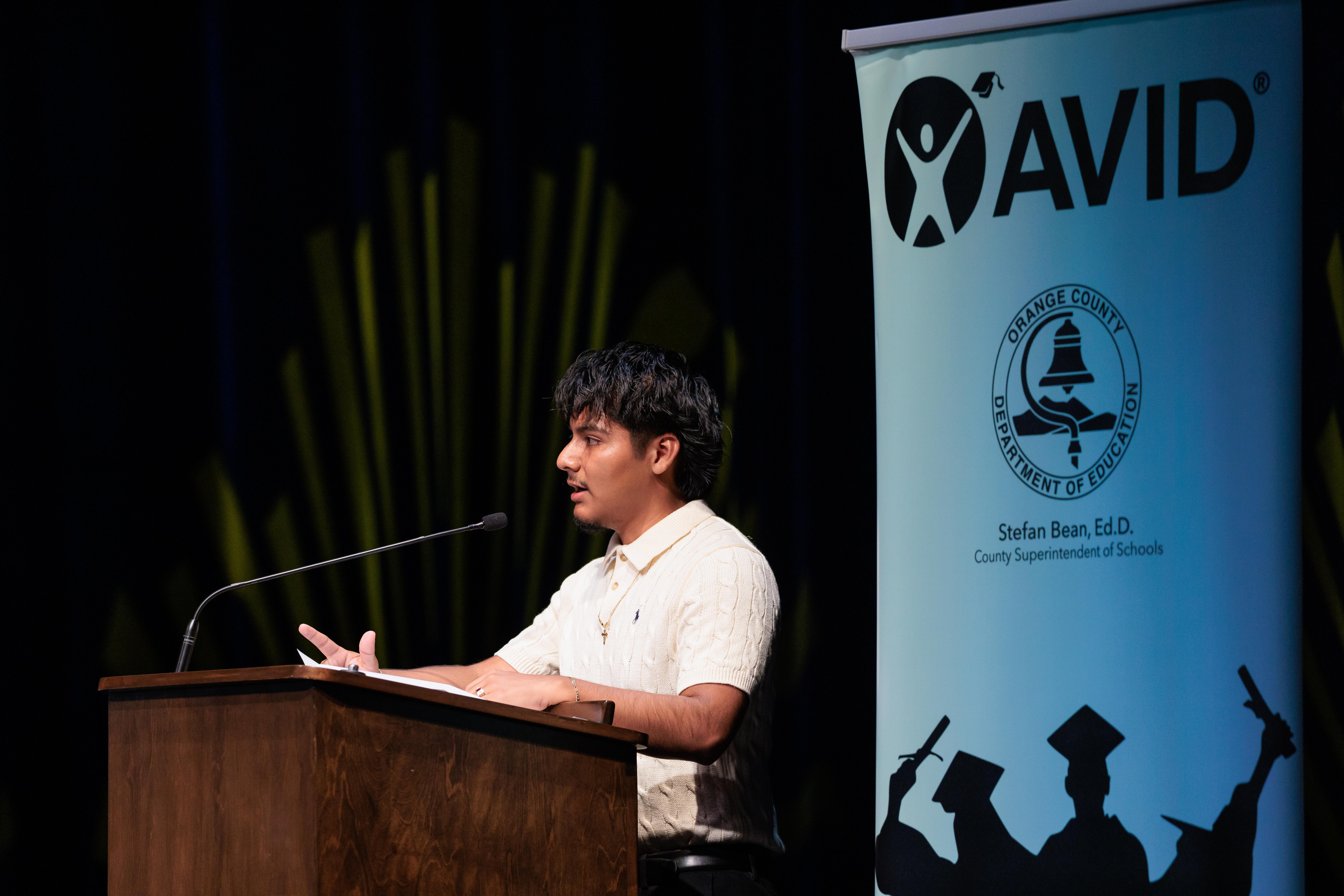 Delver Camacho of Santiago High School speaks during the 2026 OC AVID Senior Standout Recognition and Scholarship Presentation at the Irvine Barclay Theatre.