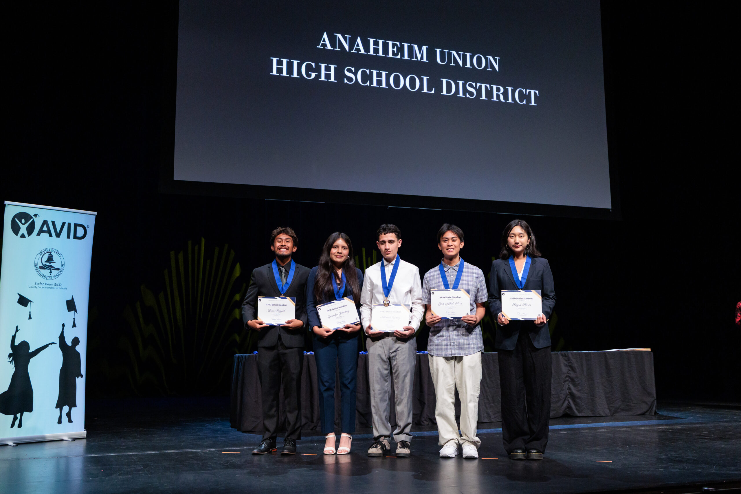 Scholarship recipients are recognized on stage during the 2026 OC AVID Senior Standout Recognition and Scholarship Presentation.