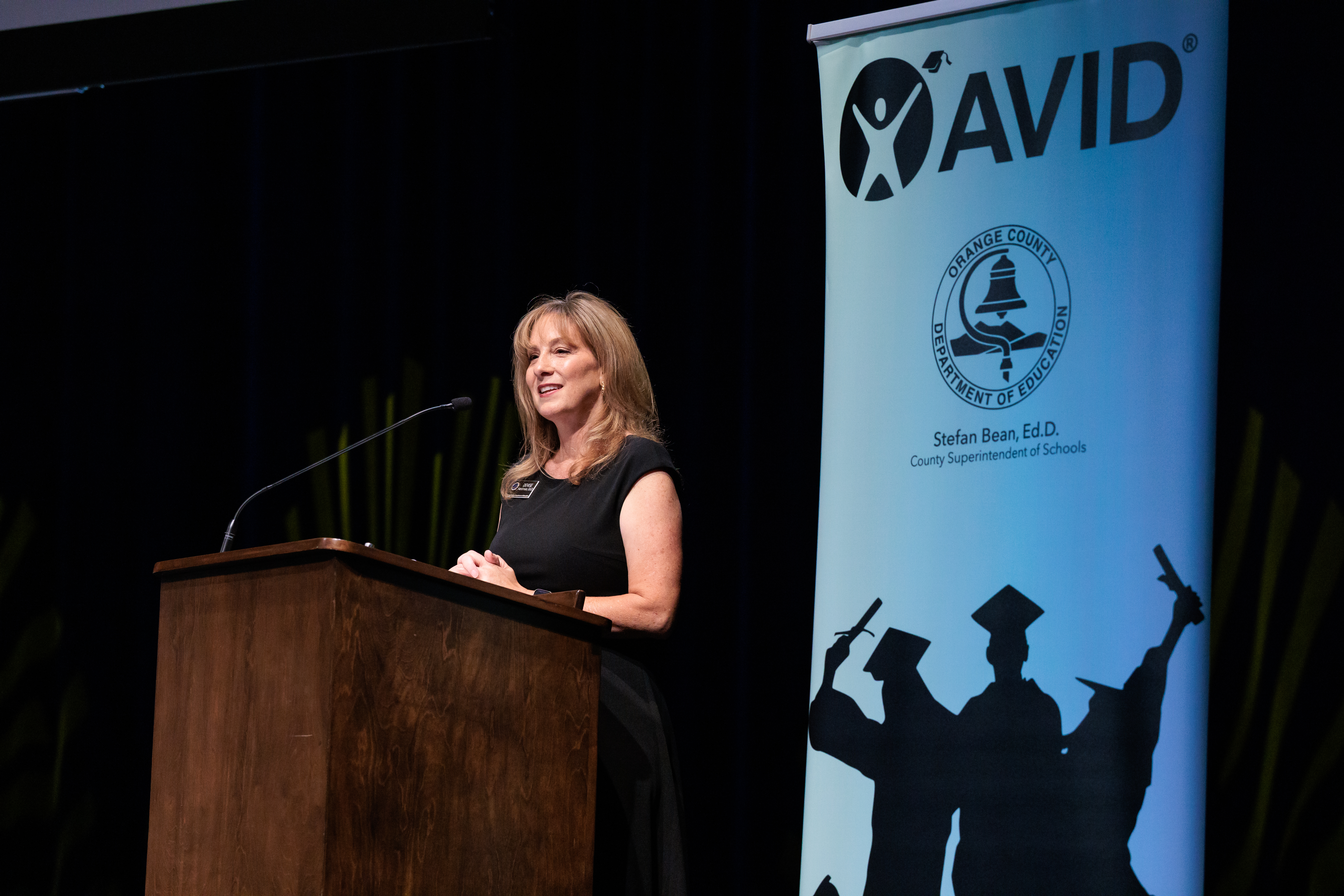 Dr. Denise Harshman, coordinator of Advancing Learning at the Orange County Department of Education, speaks during the 2026 OC AVID Senior Standout Recognition and Scholarship Presentation.