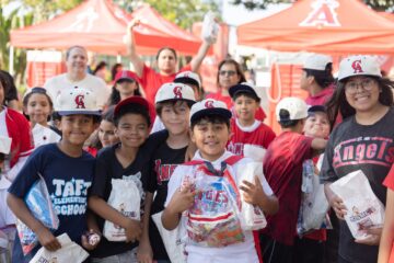 Students participating in the OC GRIP program gather at Angel Stadium before the Los Angeles Angels’ May 19 game against the Oakland Athletics.
