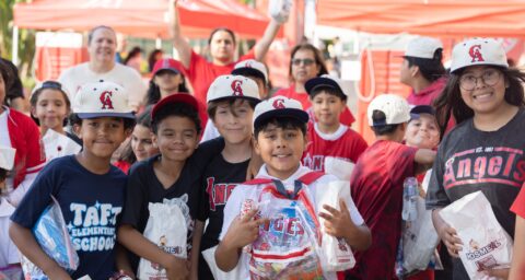 Students participating in the OC GRIP program gather at Angel Stadium before the Los Angeles Angels’ May 19 game against the Oakland Athletics.