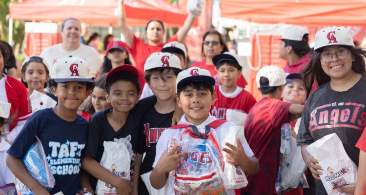 Students participating in the OC GRIP program gather at Angel Stadium before the Los Angeles Angels’ May 19 game against the Oakland Athletics.