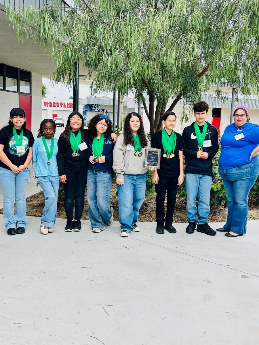 Students from Hosler Middle School in the Lynwood Unified School District pose for a photo.