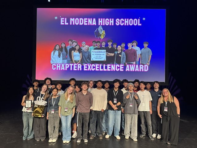 Students and advisors from El Modena High School stand onstage after receiving a Chapter Excellence Award at the Friday Night Live recognition ceremony.