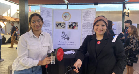 Saddleback Valley Unified School District students Deepali Srinivas and Gianella Rodriguez showcase their honored project, "ShamPOOCH-inator" at the OcMaker Meet the Maker event Feb. 27.