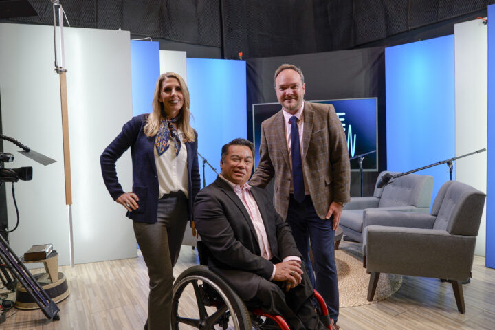 Lainie Rowell, Dr. Stefan Bean and David Blair stand together on the set of the FutureCurrent podcast studio at the Orange County Department of Education.