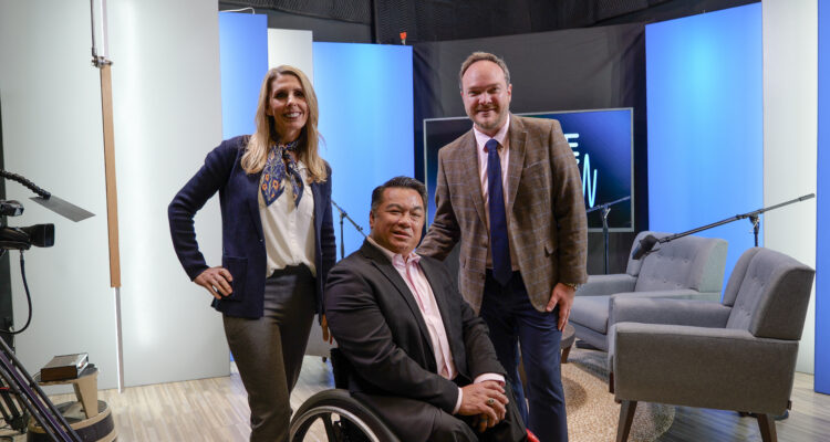 Lainie Rowell, Dr. Stefan Bean and David Blair stand together on the set of the FutureCurrent podcast studio at the Orange County Department of Education.