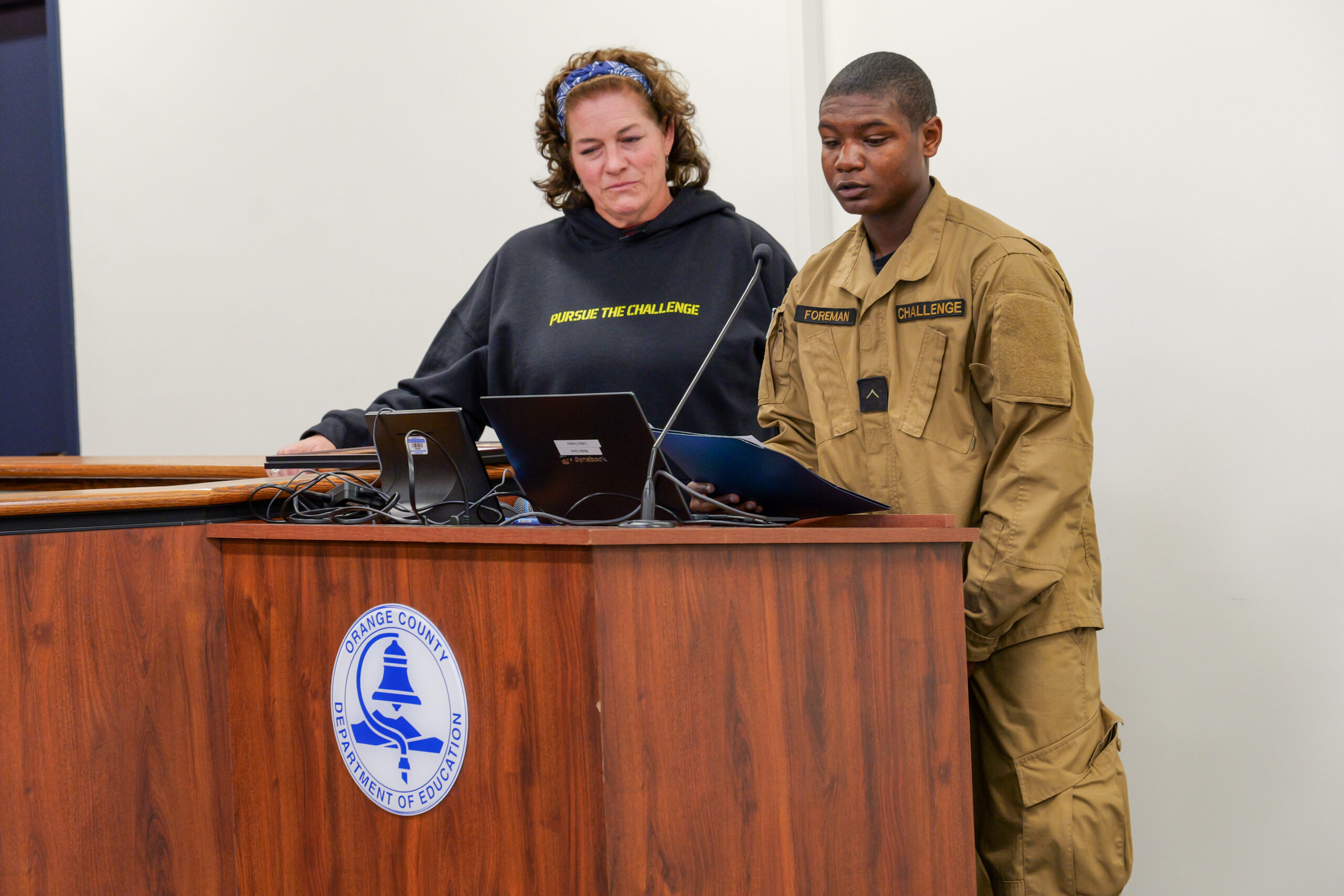 Cadet Foreman was accompanied by his teacher Elizabeth Wilson while reading his Memorial Day reflection.