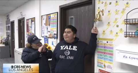 Middle College High senior Manny Mejia celebrates his Yale acceptance with family and his teachers. (Courtesy of CBS LA)