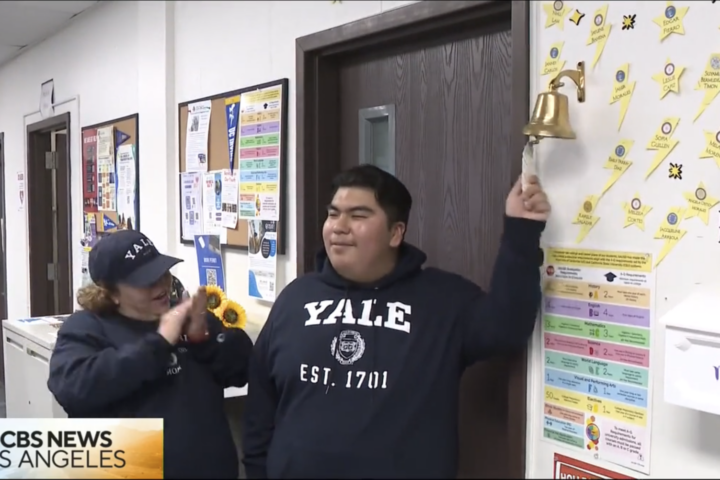 Middle College High senior Manny Mejia celebrates his Yale acceptance with family and his teachers. (Courtesy of CBS LA)