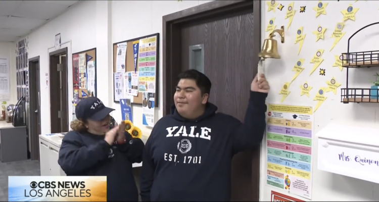 Middle College High senior Manny Mejia celebrates his Yale acceptance with family and his teachers. (Courtesy of CBS LA)