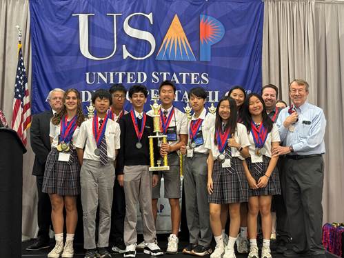 Students from Fairmont Schools’ Historic Anaheim campus pose with coaches and awards after earning second place in the Eighth Grade Invited Division at the 2026 United States Academic Pentathlon National Finals in Nashville, Tennessee.
