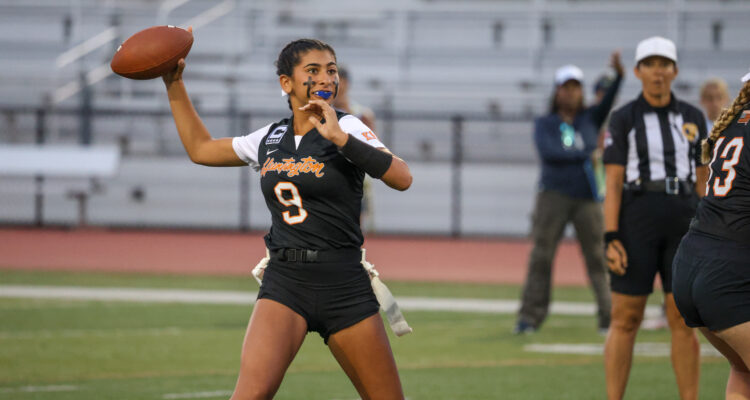 Huntington Beach Quarterback Roxie Shaia drops back to pass in a game against Marina High School.