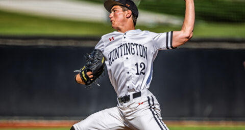 Jared Grindlinger pitching in a game for Huntington Beach High School against Marina High School