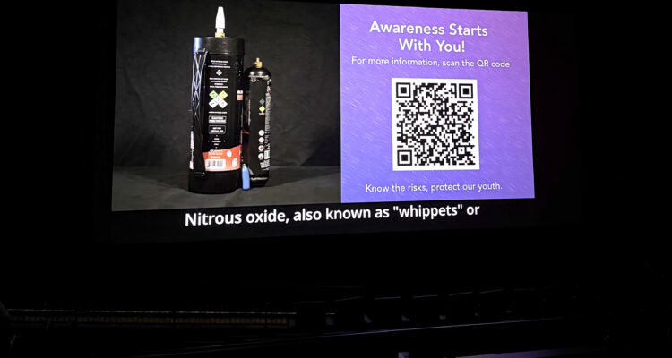 A public service announcement produced by the Orange County Department of Education plays before a movie at Regal Garden Grove, raising awareness about the risks of nitrous oxide misuse.