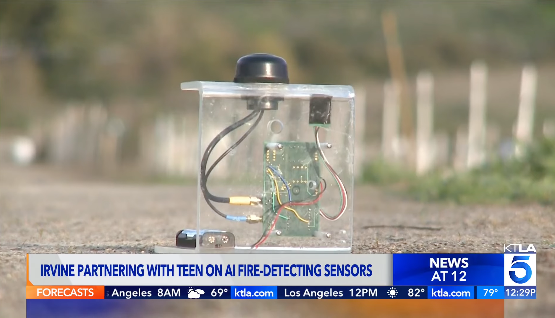 A SensoRy AI wildfire detection sensor is shown during a KTLA 5 report on the company's partnership with the City of Irvine to expand early wildfire detection efforts.
