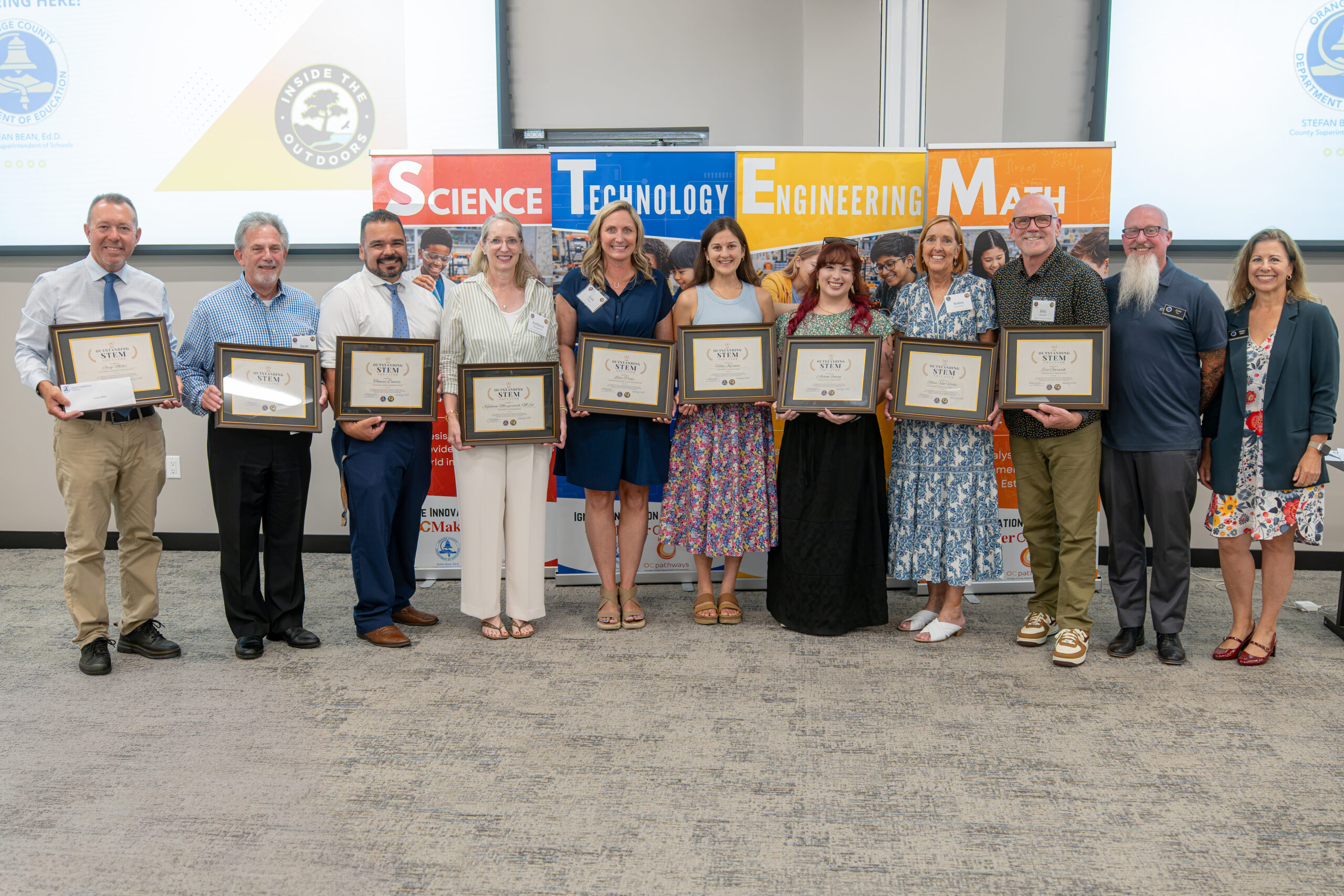 Nine recipients of the 2026 Outstanding STEM Educator Awards gather with OCDE staff following the Aug. 4 awards celebration at the Orange County Department of Education Conference Center in Costa Mesa.