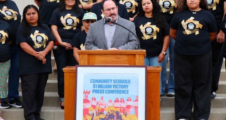 Anaheim Union High School District Superintendent Jaron Fried leads community members in the community schools celebration at Anaheim High School Aug. 4. (Courtesy of AUHSD)