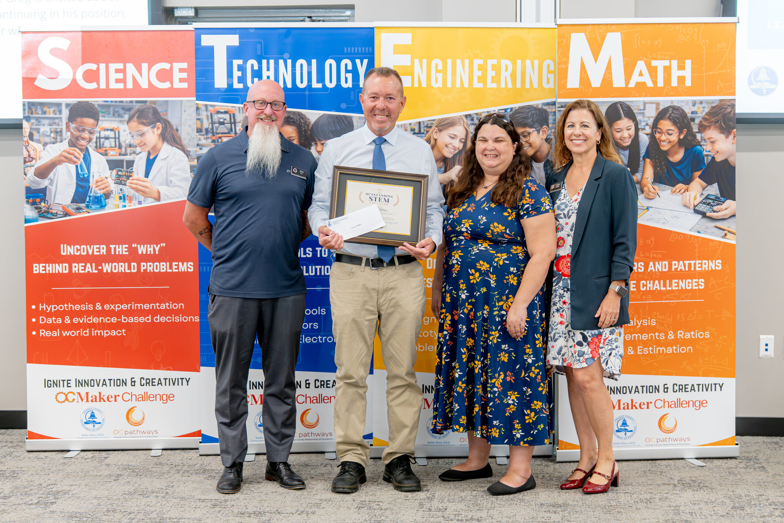 Greg Miller of the Orange Unified School District receives an Outstanding Leadership in STEM Education Award.