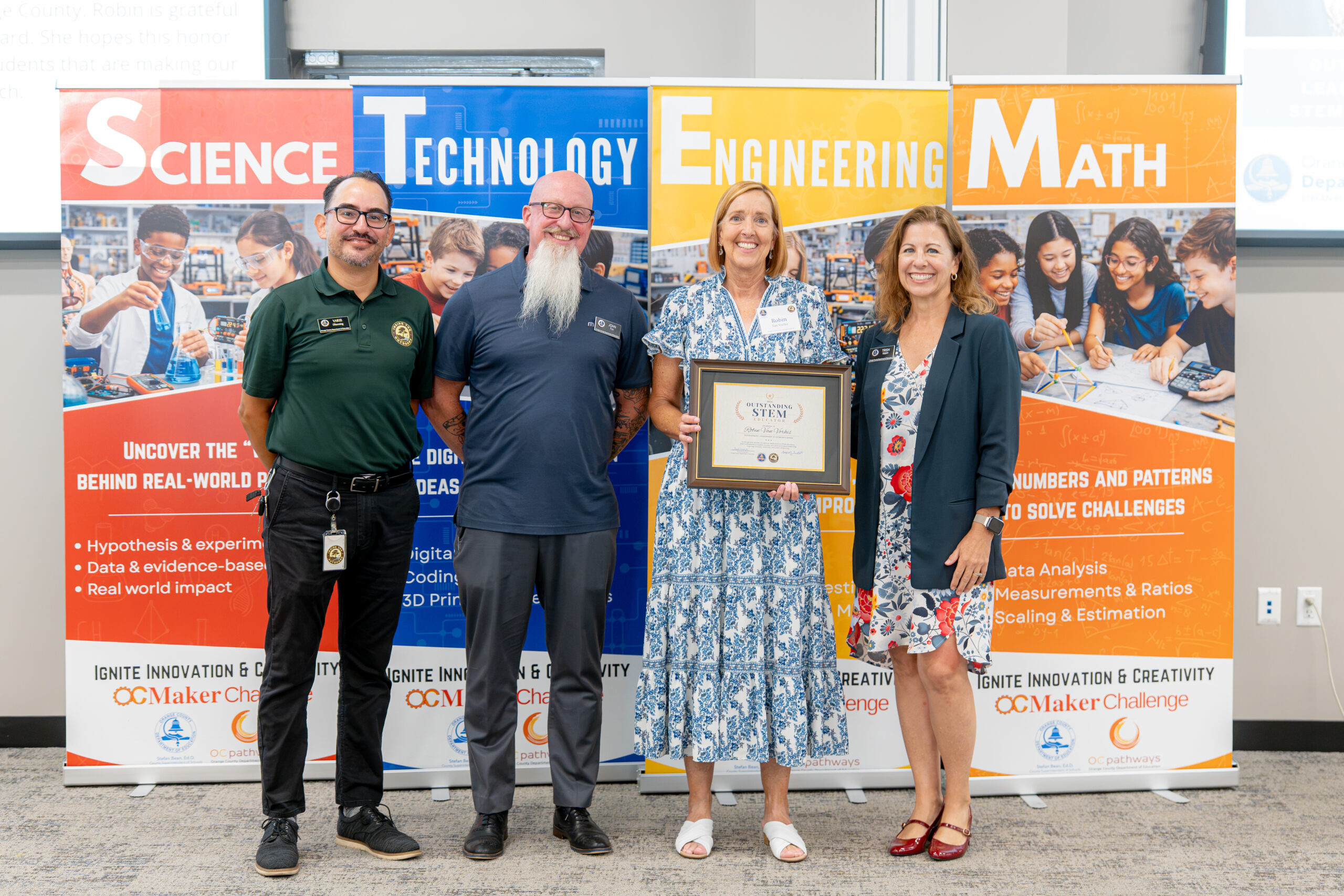 Robin Van Vorhis of the Orange County Science & Engineering Fair receives a Leadership in STEM Education Award.