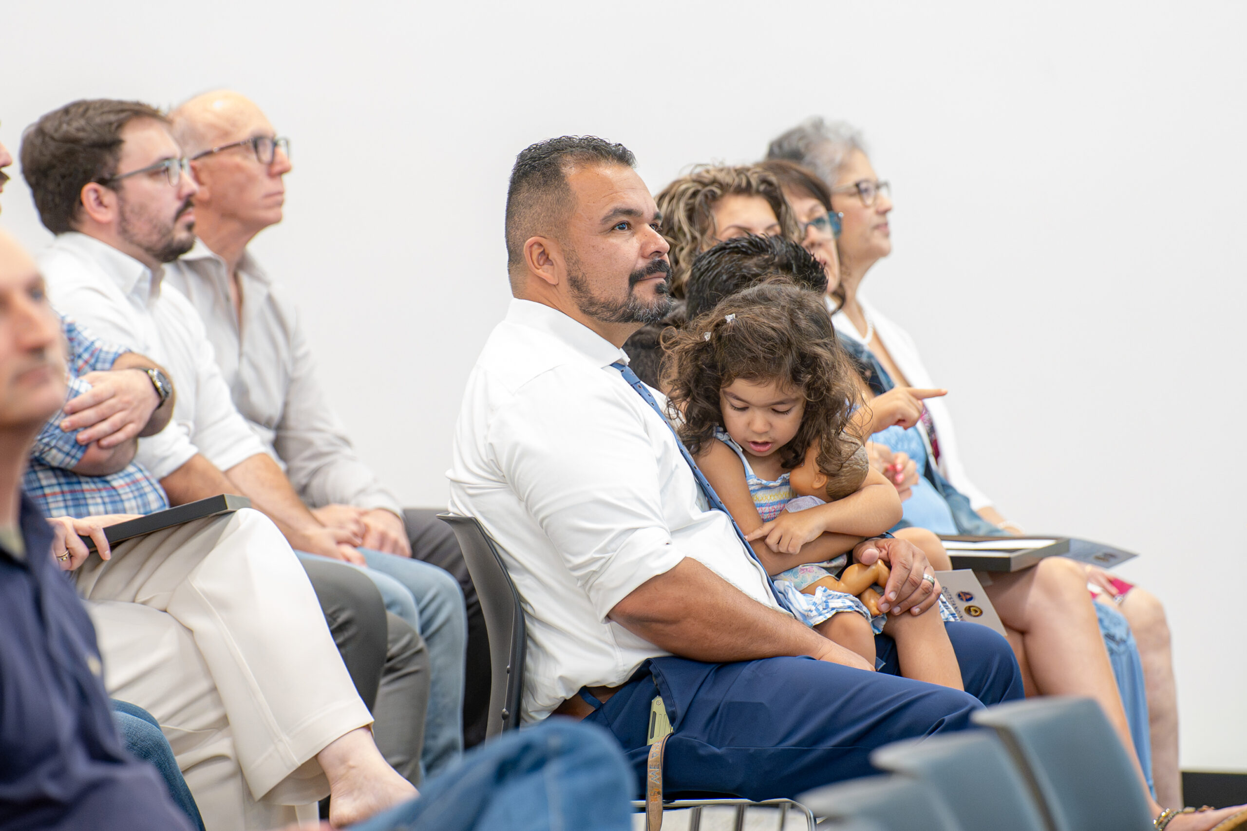 Guests watch as Orange County educators and community leaders are recognized for their contributions to STEM education.