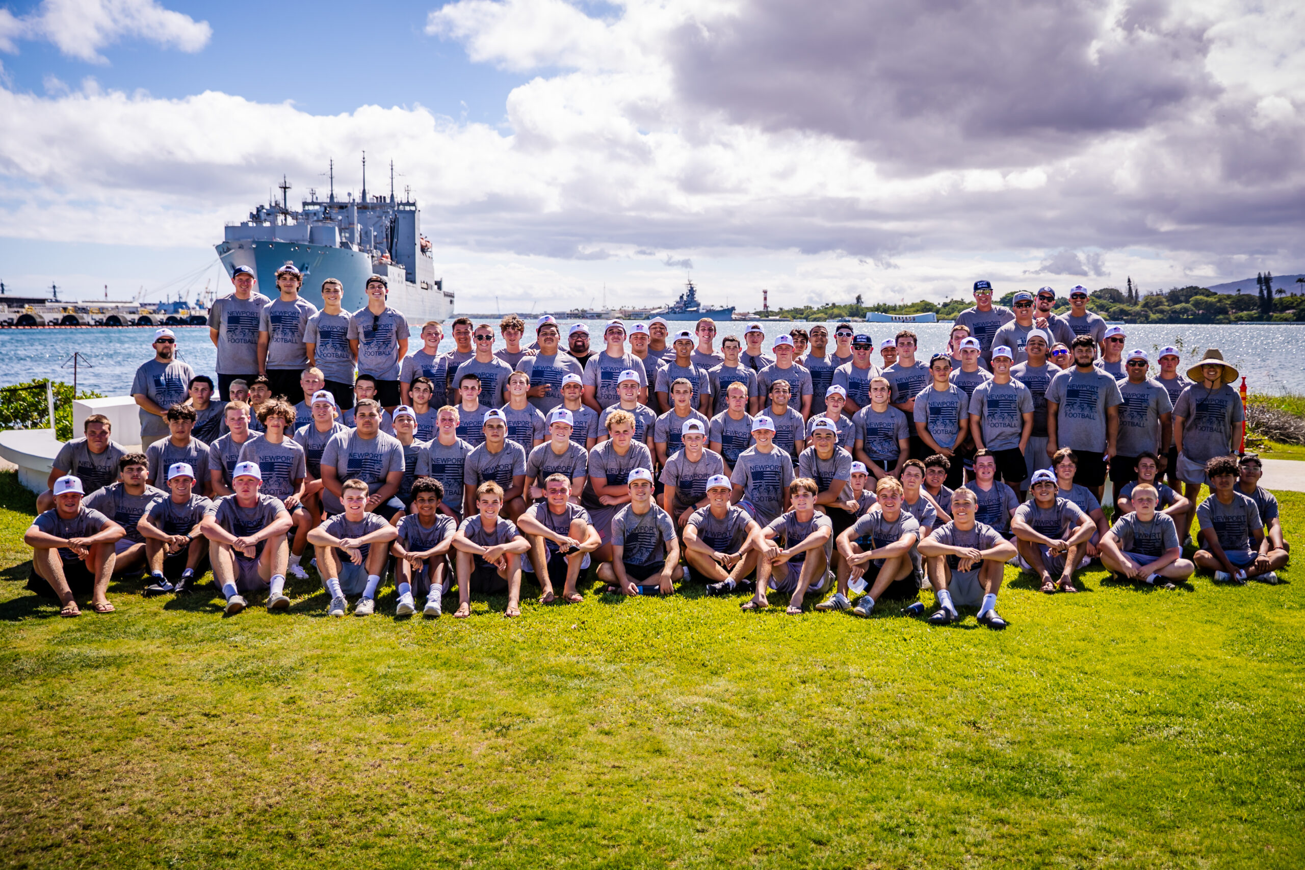 The Newport Harbor football team poses for a photo during their trip to Pearl Harbor before their game against Nanakuli in Oahu.