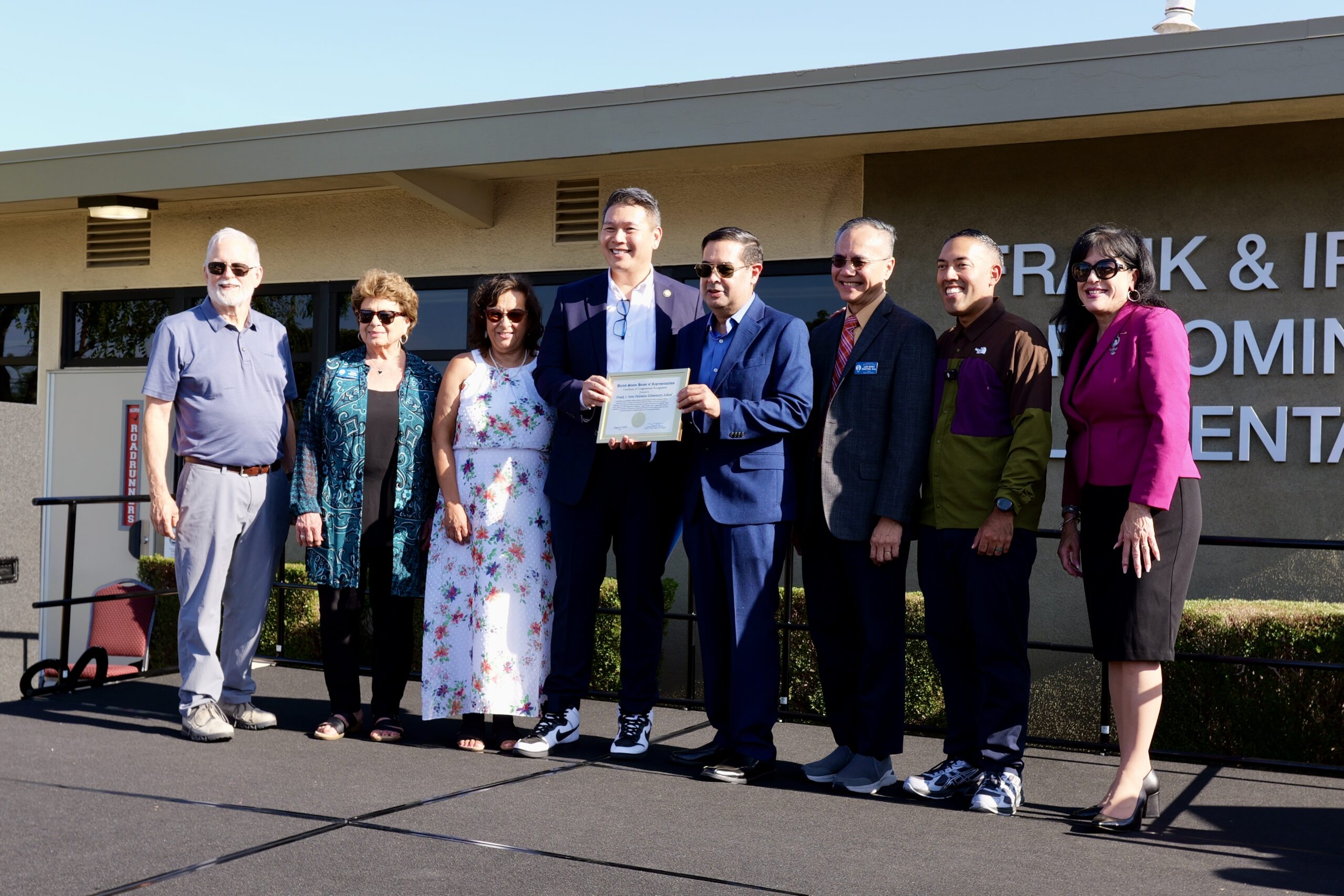Rep. Derek Tran presented the Palomino family with a certificate of recognition at the ribbon-cutting ceremony to rename the former Rosita Elementary
