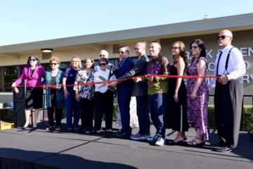 Members of the Palomino family and local officials cut a ribbon to commemorate the renaming of the formerly Rosita Elementary to Frank and Irene Palomino Elementary