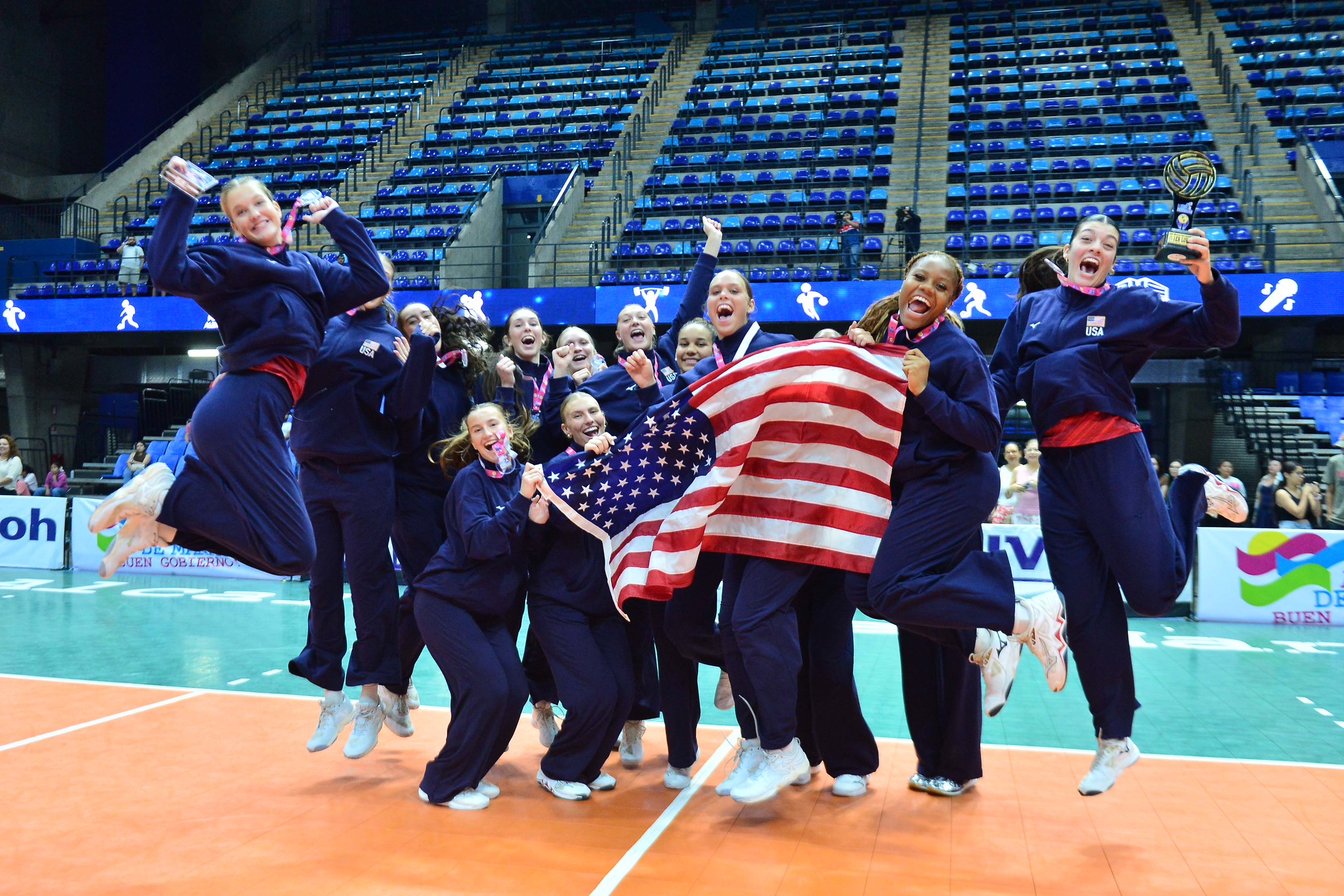 The U.S. Women’s U23 Volleyball team celebrates with their medals after wining gold at the NORCECA U23 Pan American Cup. (Courtesy of NORCECA)
