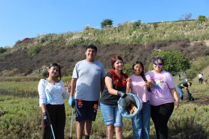 Volunteers take part in a previous California Coastal Cleanup Day at Upper Newport Bay in Newport Beach.