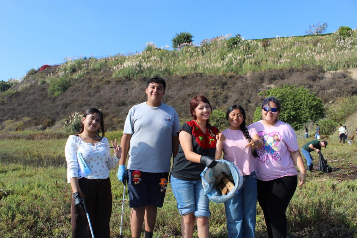 Volunteers take part in a previous California Coastal Cleanup Day at Upper Newport Bay in Newport Beach.
