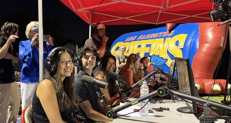 Los Alamitos High School students work behind the microphones during the school’s first student-produced live varsity football broadcast on Sept. 4.