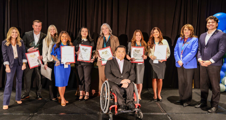 Orange County Superintendent of Schools Dr. Stefan Bean, center, joins OCDE staff and the 2026 Orange County Counselors and Advocates of the Year at the 12th annual Orange County Counselor Symposium on Feb. 4.