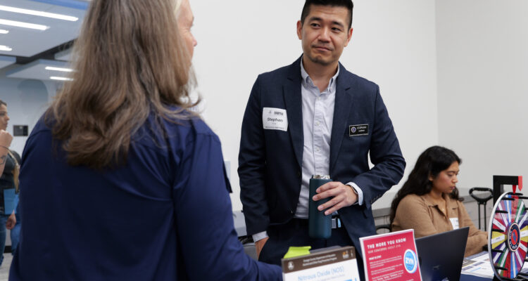 OCDE Prevention Education Coordinator Stephan Lambert speaks with an attendee during the department’s Thrive Resource Fair on Sept. 25, 2025, at the OCDE Conference Center in Costa Mesa.