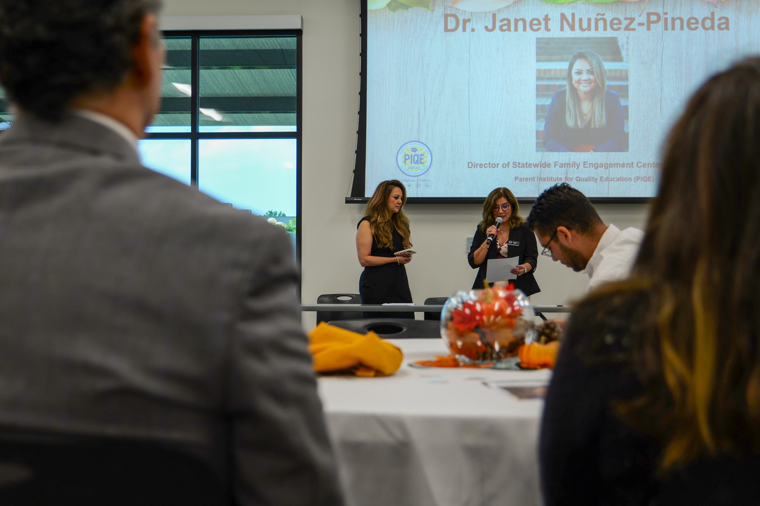 OCDE Language Services Coordinator Natalia Abarca, right, introduces keynote speaker Dr. Janet Núñez-Pineda during the 2025 International Translation Day celebration at the OCDE Conference Center.