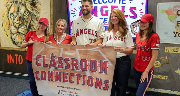 Los Angeles Angels pitcher Trey Murphy visits staff and students at Lomarena Elementary School to present a special $2,000 Classroom Connections grant toward STEM education programs. (Courtesy of Angels Baseball Foundation)