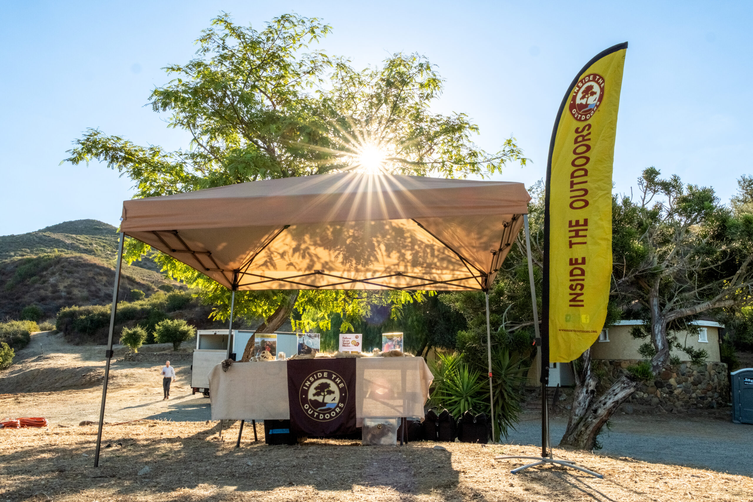 Morning sunlight shines over an Inside the Outdoors display at Rancho Soñado ahead of the groundbreaking ceremony for the new education center.