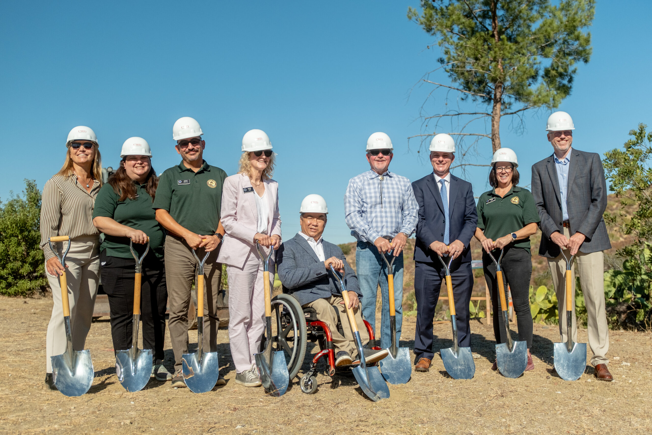 From left, Lynne Pentecost, CEO of Schoolhaus Advisors Inc.; Sara Ludovise and Yarib Dheming of OCDE’s Inside the Outdoors; Orange County Board of Education Trustee Mari Barke; Orange County Superintendent of Schools Dr. Stefan Bean; board Clerk Dr. Ken Williams; board President Tim Shaw; Inside the Outdoors Operations Manager Stephanie Smith; and Robert Demmond, associate principal with tBP/Architecture, gather for the Rancho Soñado groundbreaking.
