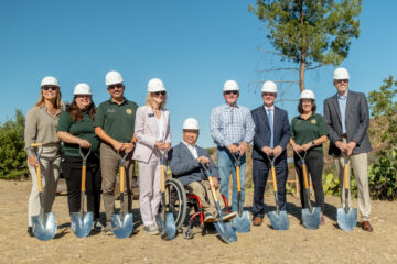 From left, Lynne Pentecost, CEO of Schoolhaus Advisors Inc.; Sara Ludovise and Yarib Dheming of OCDE’s Inside the Outdoors; Orange County Board of Education Trustee Mari Barke; Orange County Superintendent of Schools Dr. Stefan Bean; board Clerk Dr. Ken Williams; board President Tim Shaw; Inside the Outdoors Operations Manager Stephanie Smith; and Robert Demmond, associate principal with tBP/Architecture, gather for the Rancho Soñado groundbreaking.
