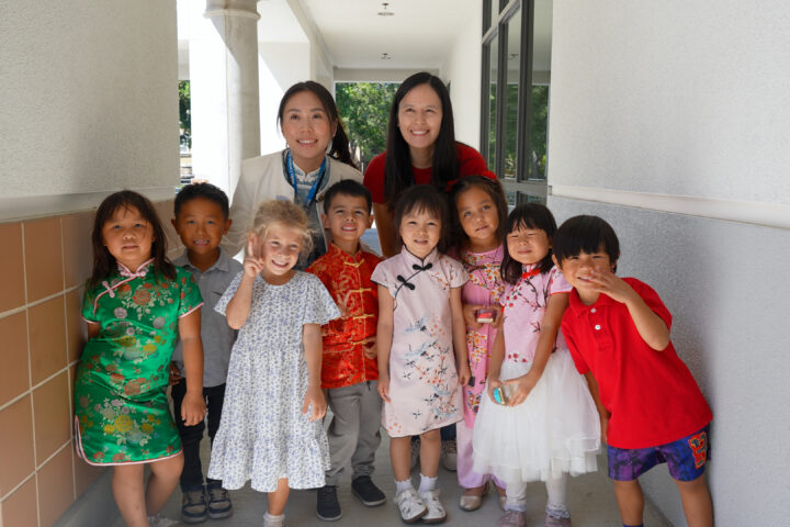 Students in Hicks Canyon Elementary School's Mandarin Immersion Program pose with educators during the school's Mid-Autumn Festival celebration. Several children wore traditional Chinese-inspired clothing for the occasion. (Photo courtesy of the Tustin Unified School District)