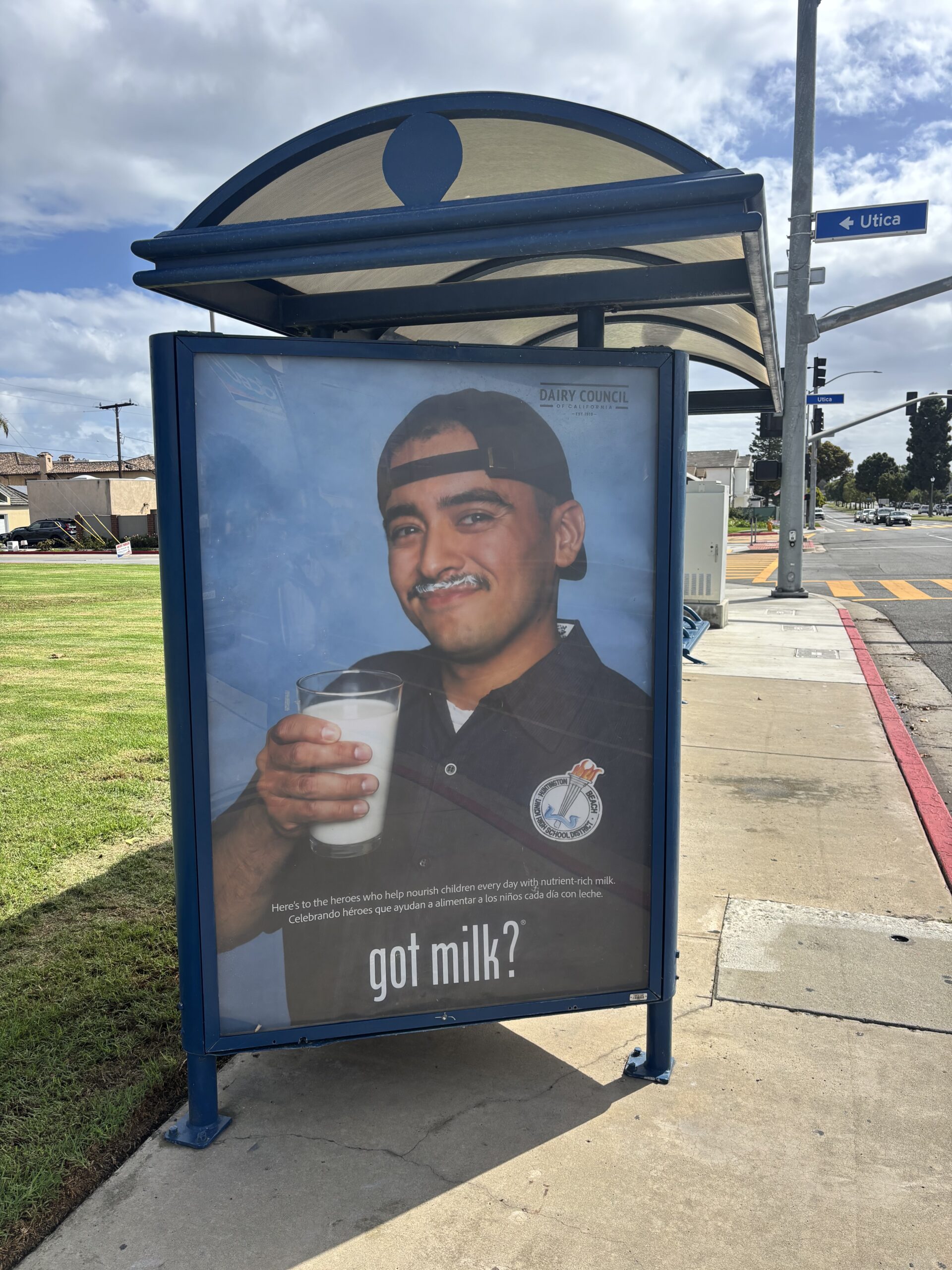 Huntington Beach Union High School District Nutrition Services driver Frankie Ramos is featured in a Got Milk? advertisement at a bus stop in Huntington Beach. Six posters featuring district employees were installed as part of the campaign leading up to World School Milk Day on Sept. 30.