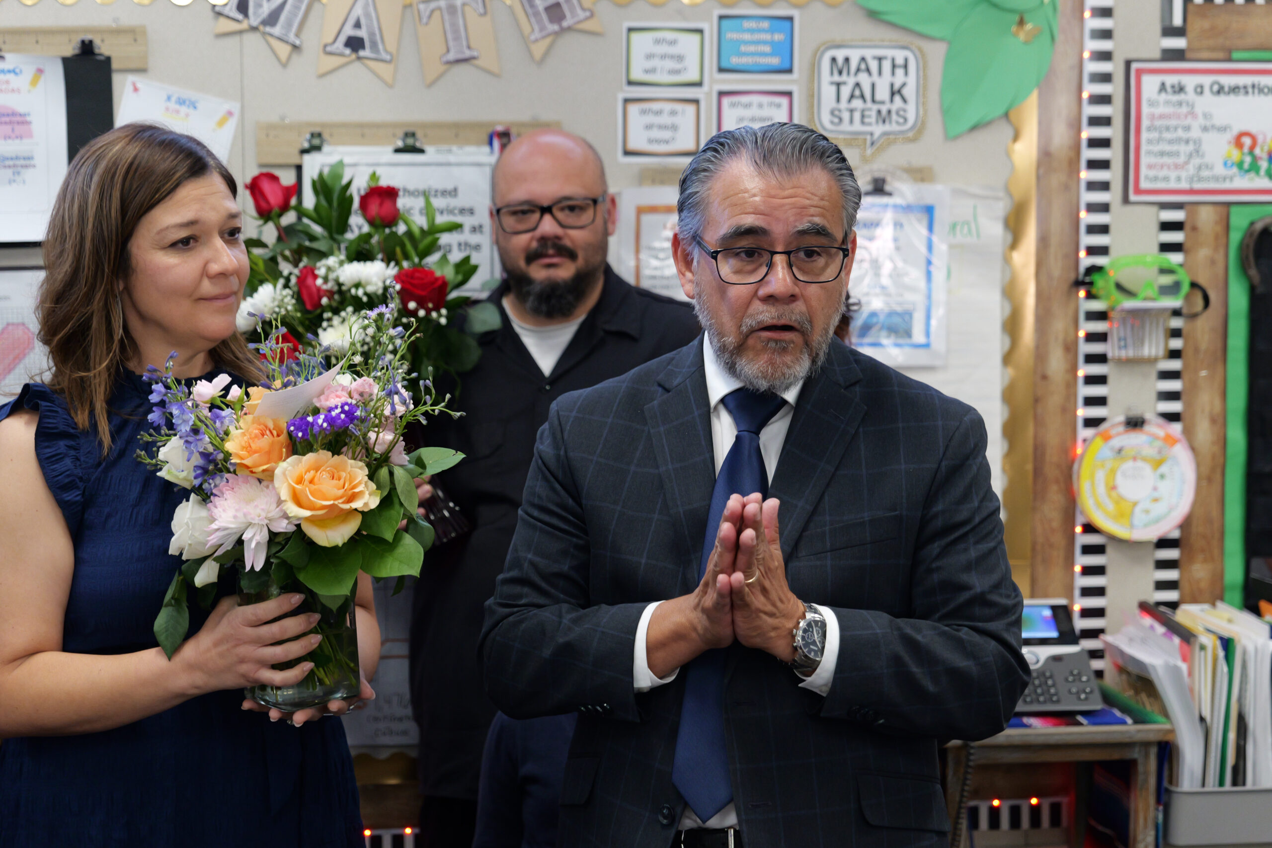 Anaheim Elementary School District Superintendent Jesús Chavarria congratulates Wendy Saldivar during the April surprise announcement at Loara Elementary School.