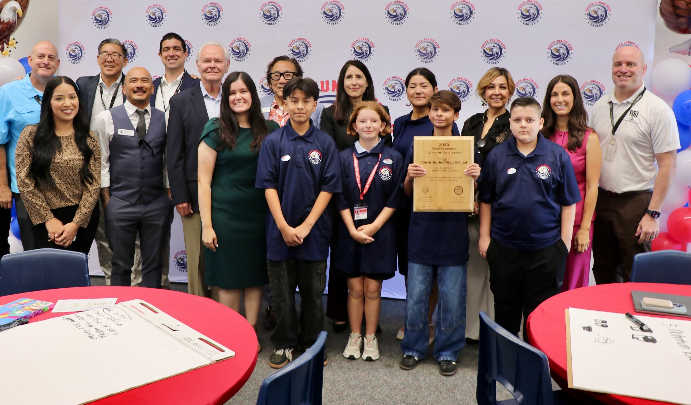 Anaheim Union High School District students, teachers, board trustees and leadership proudly display their new Civic Learning Award of Excellence alongside Chief Justice Guerrero.